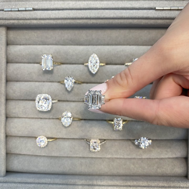 4.10 carat Emerald Lab Diamond Three Stone Ring flat