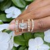 4.22 carat Emerald Cut Lab Diamond Signature Wrap Ring lifestyle flowers