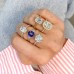 Blue Oval Sapphire and Diamond Three-Stone Ring lifestyle