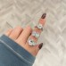 3.77 carat Cushion Cut Lab Diamond Three-Stone Ring lifestyle finger