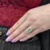 Oval Merelani Mint Garnet Swoop Halo Ring  lifestyle