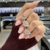 3.02 carat Emerald Cut Lab Diamond Three-Stone Ring lifestyle clench