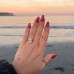 4.06 carat Oval Lab Diamond Two-Tone Solitaire Engagement Ring lifestyle beach