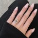 2.71 carat Emerald Cut Lab Diamond Bezel Set Ring lifestyle hand in lap