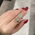 2.71 carat Emerald Cut Lab Diamond Bezel Set Ring lifestyle finger stacked