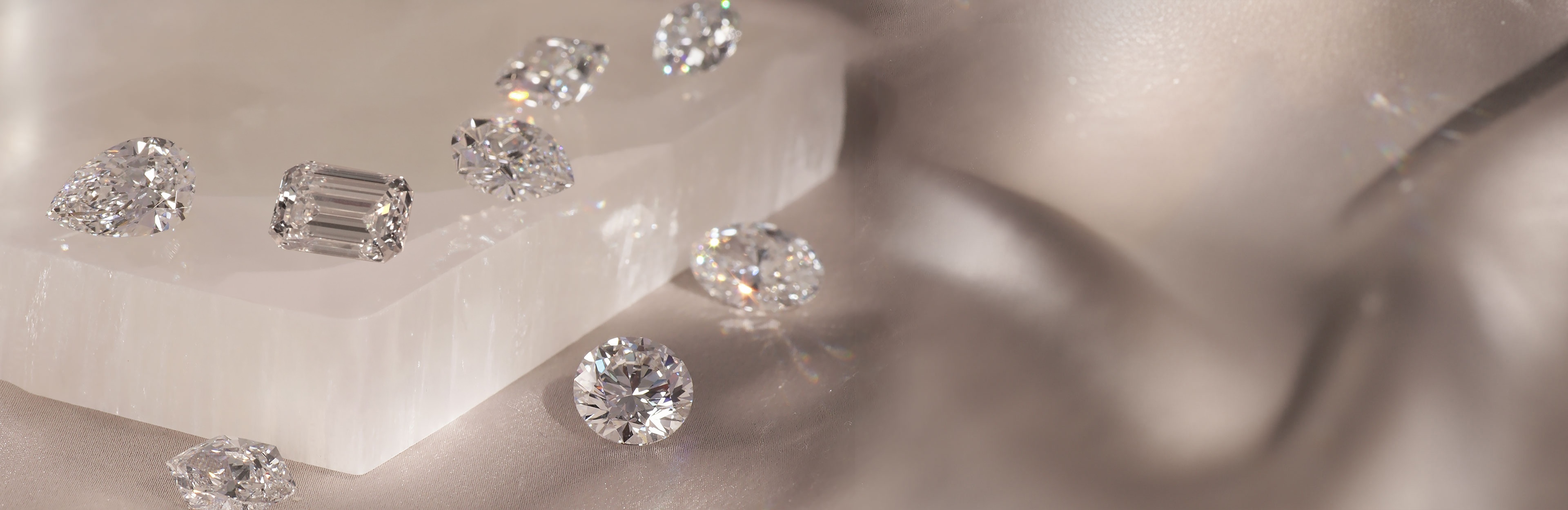 loose diamonds on marble