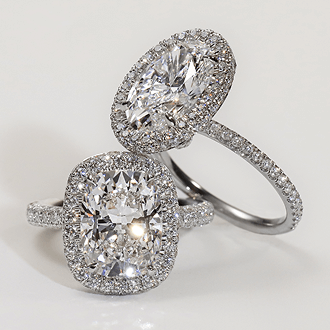 Pair of Diamond Halo Rings.