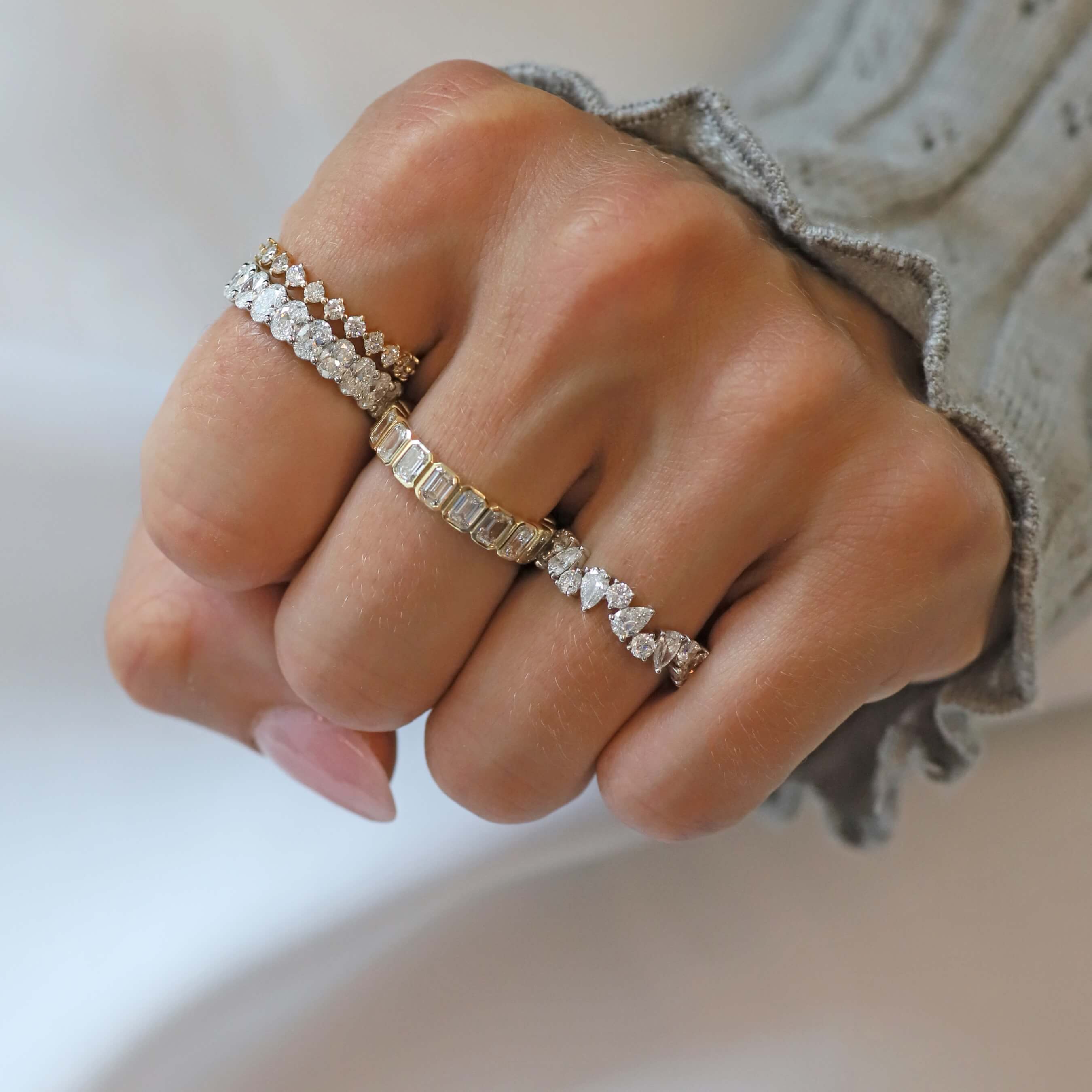 Diamond Wedding Bands on Woman's Fingers.